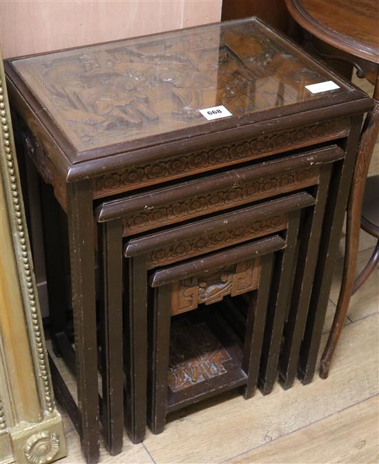 A nest of four Chinese tables, H65cm